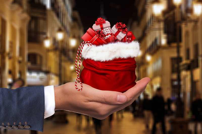 indoors, santa claus, nicholas, celebration event, holiday, road, celebration, dollar, event, holding, christmas, human body part, keep, gift, red, one person