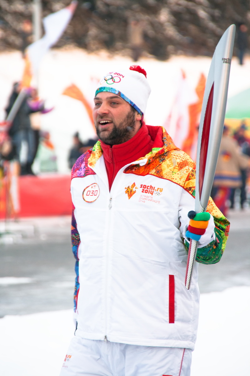 people, active, sport, hands, ceremony, russia, flame, action, young adult, 2K, standing, one person, facial hair, street, torch, occupation, beard, real people