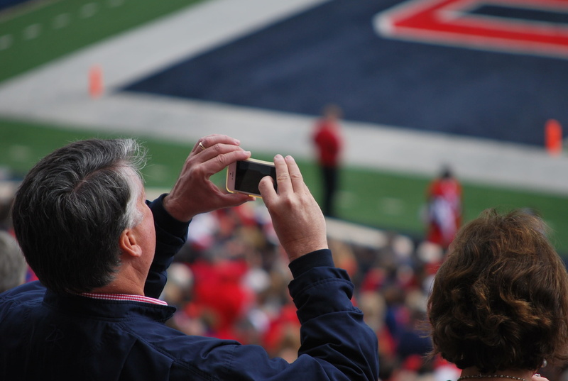blue, photography themes, spectator, photographing, modern, sport, electronic, mobile phone, mobile, football, focus on foreground, cellular, gadget, man