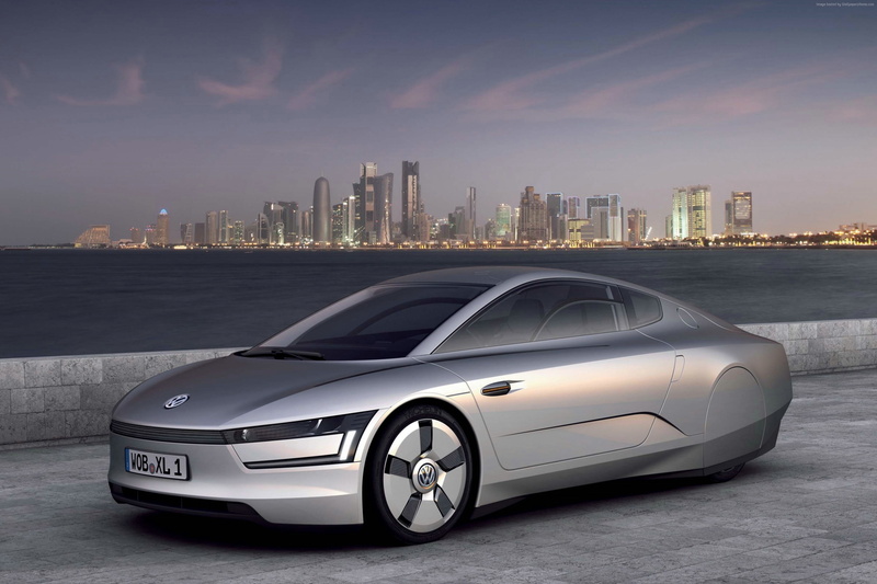 test drive, mode of transportation, skyscraper, Best Electric Cars 2015, sky, outdoors, landscape, Volkswagen, limited edition, transportation, office building exterior