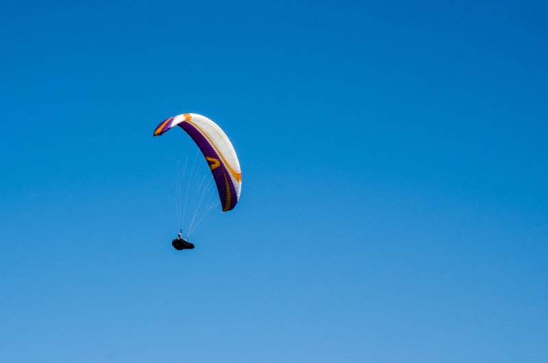 2K, rio de janeiro, day, parachute, mid-air, clear sky, freedom, city park, outdoors, excitement, paragliding, blue, brazil, Olympics, unrecognizable person