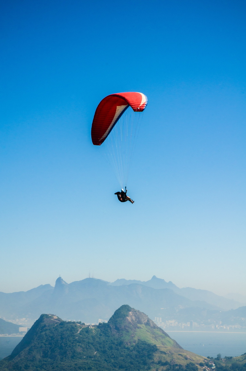 beauty in nature, sky, rio de janeiro, adventure, mid-air, lifestyles, city, extreme sports, scenics - nature, mountain, unrecognizable person, flying