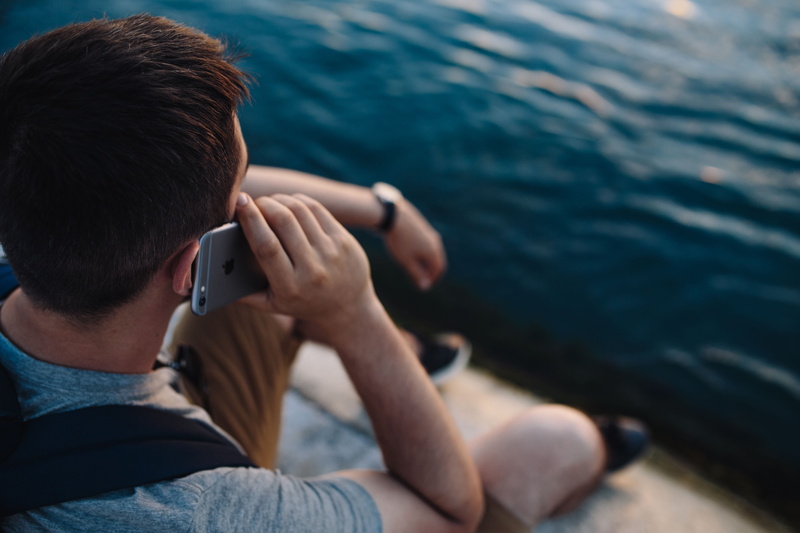 adult, activity, people, water, tech, technology, men, Mobile phone, young men, phone in, phone, one Person, iphone, casual clothing, male, looking, mobile