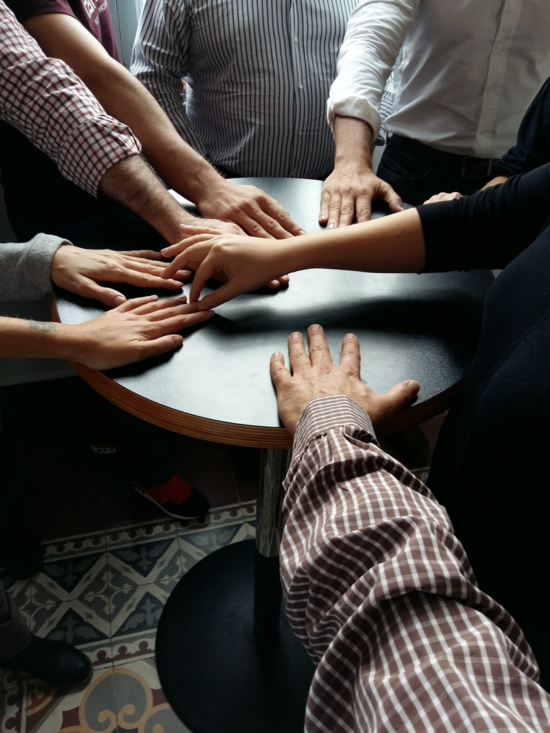 indoors, casual clothing, hand, table, men, teamwork, human body part, midsection, group of people, finger, adult, labor, women, 2K, cooperation, esteem