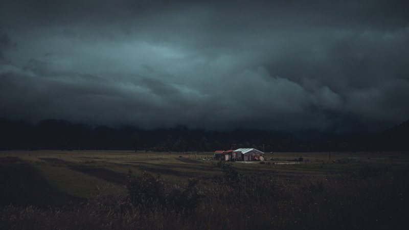 clouds, outdoors, rural scene, green, no people, nature, animal, power in nature, cloud - sky, environment, dark, house, storm cloud, sky, scenics - nature