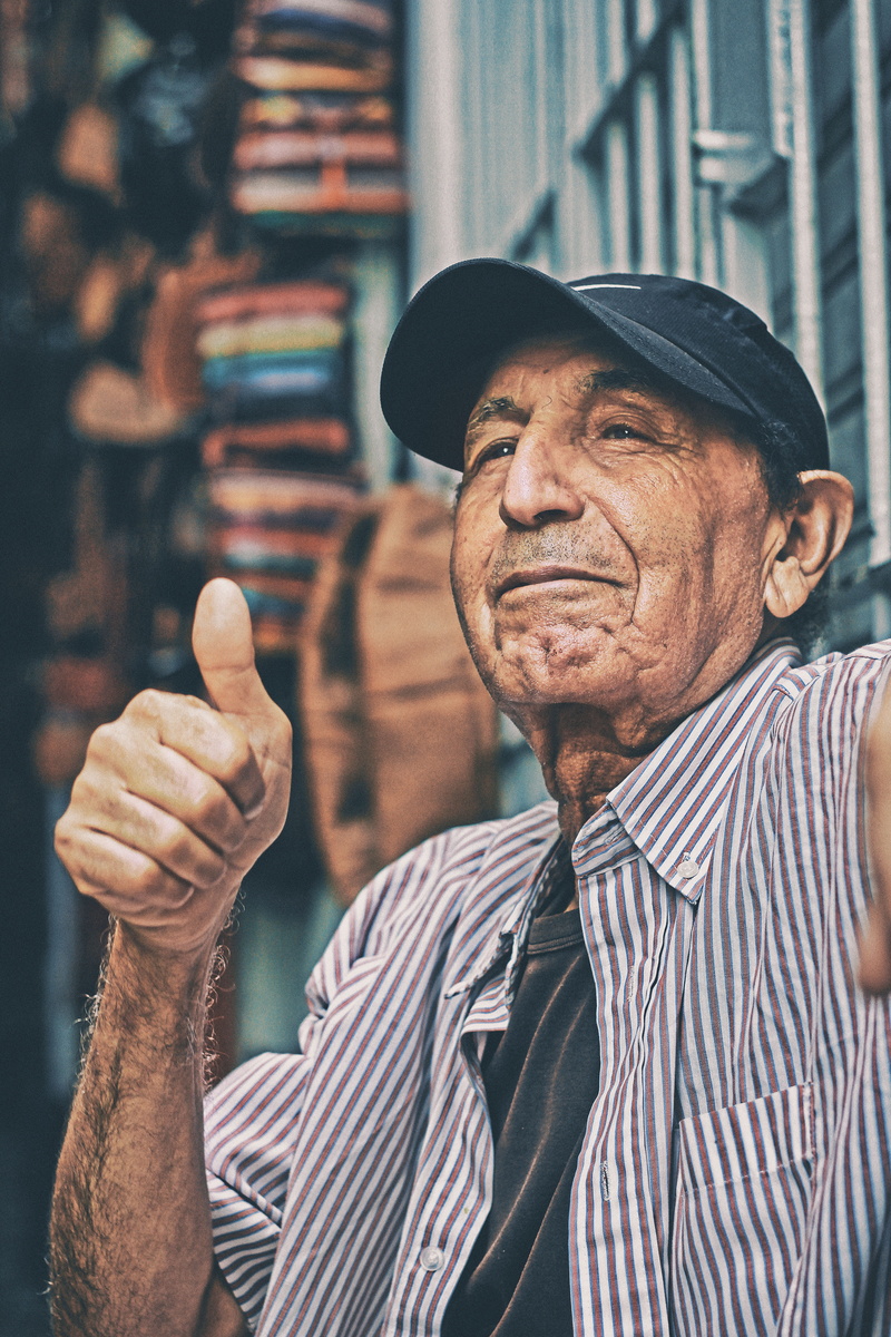 thumbs, senior men, wearing, yes, cap, dress, happy, casual clothing, one person, looking at camera, pinstriped, gesturing, man, 5K, senior adult, real people