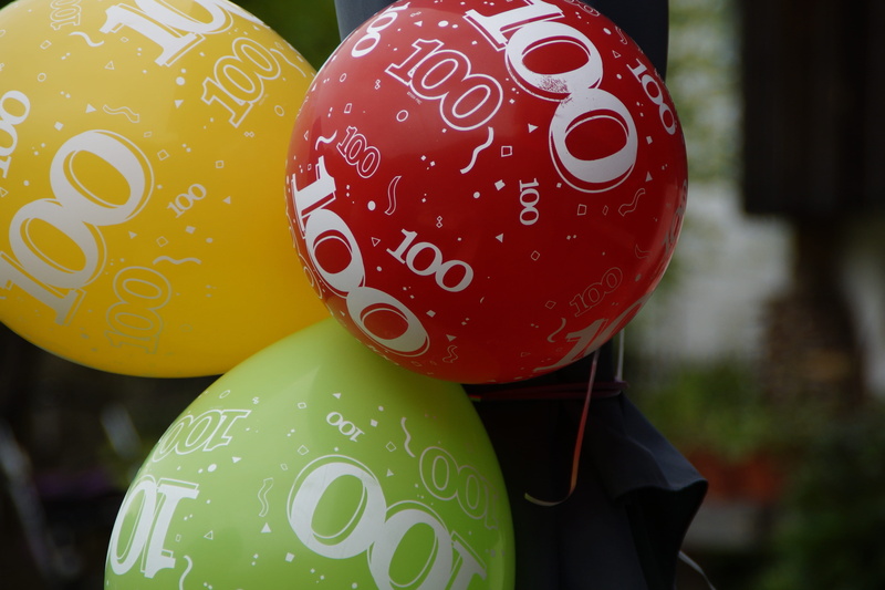 celebration, representation, security, digits, balloons, red, yellow, no people, day, festival, emotion, black, outdoors, 5K, childhood, three, focus on foreground