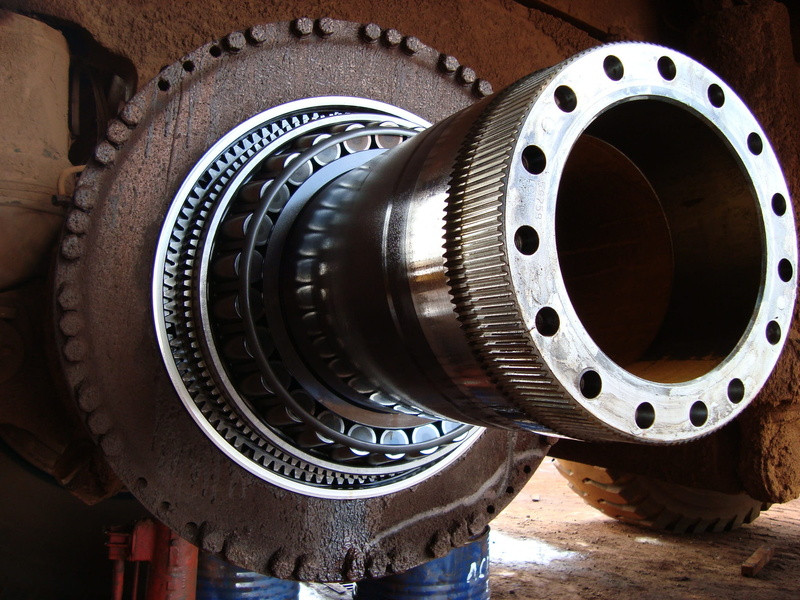 professional, industry, heavy machinery, equipment, people working, machine part, old, geometric shape, truck, indoors, wheel, gear, day, tire, industrial equipment