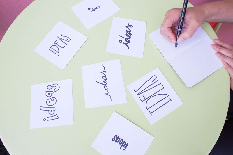 writing, hand, art and craft, business, pad, communication, write, ideas, adult, close up, human body part, adhesive note, indoors, paper, strategy, blur