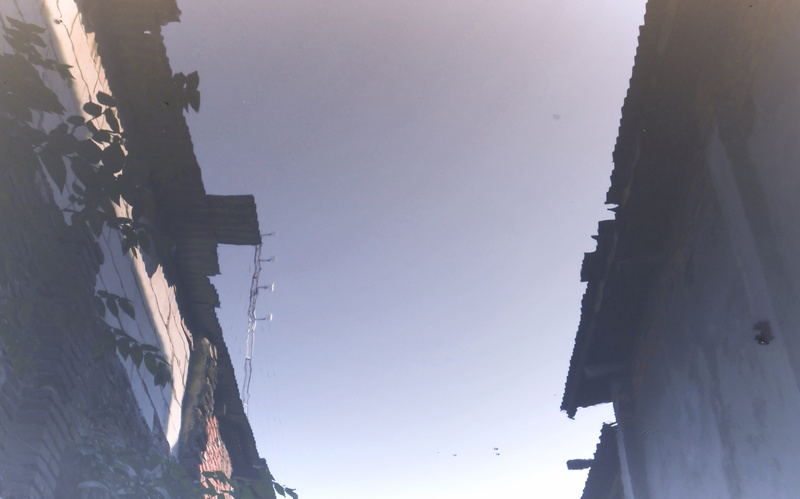 river, built structure, kampung, wall, upside, sunlight, indonesia, residential district, roof, copy space, sky, surabaya, building, street, travel destinations