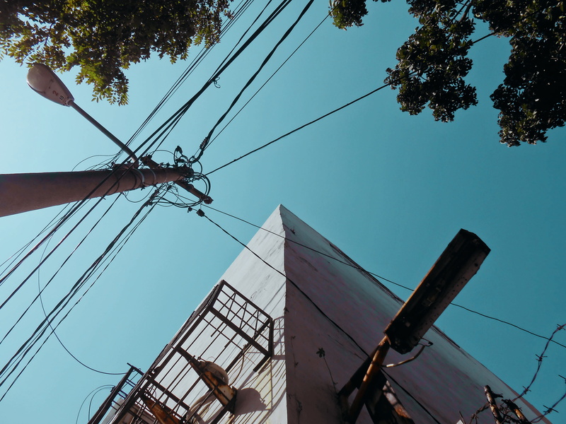 tree, frame, built structure, fuel and power generation, lamp, power supply, no people, wall, outdoors, indonesia, metal, technology, power line, surabaya