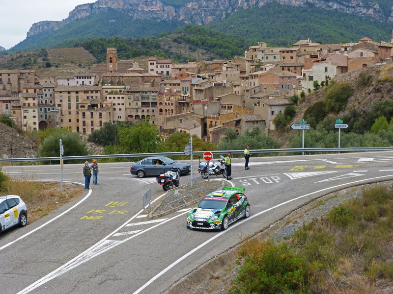 nature, building, group of people, transportation, wrc, daytime, rally catalunya, mode of transportation, stretch, output, mountain, car, control, priorat