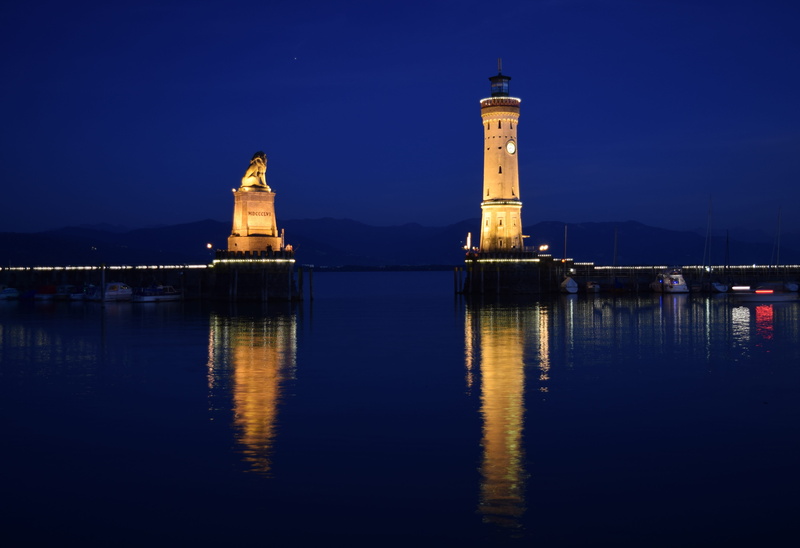 summer, sky, landmark, waters, harbour entrance, built structure, travel destinations, tower, reflection, outdoors, mood, bavaria, evening, port, waterfront