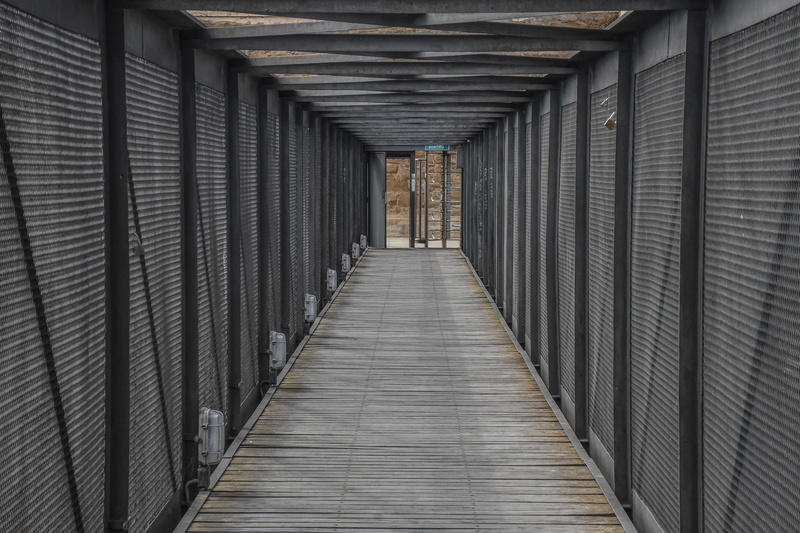 aisle, arcade, footpath, passage, output, in a row, ceiling, building, steel, protection, architecture, bars, absence, tunnel, network server, vacuum, security