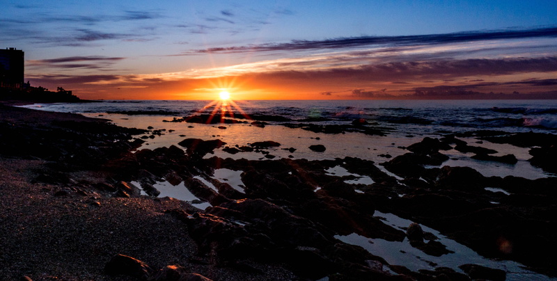 dusk, rock, bright, coastline, stillness, sun, clouds, output sun, lens flare, tranquility, tranquil scene, sunlight, tomorrow, beach, rock - object, calahonda