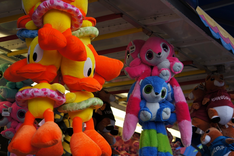 representation, winning, retail, game, entertainment, toy, retail display, art and craft, win, fairground, animal representation, cultures, midway, chinese new year