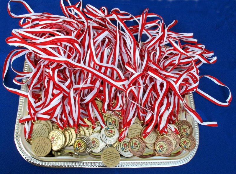 table, blue, food, craft, abundance, colored background, indoors, medals, decoration, day, still life, awards, freshness, gold, prize, food and drink, decorations