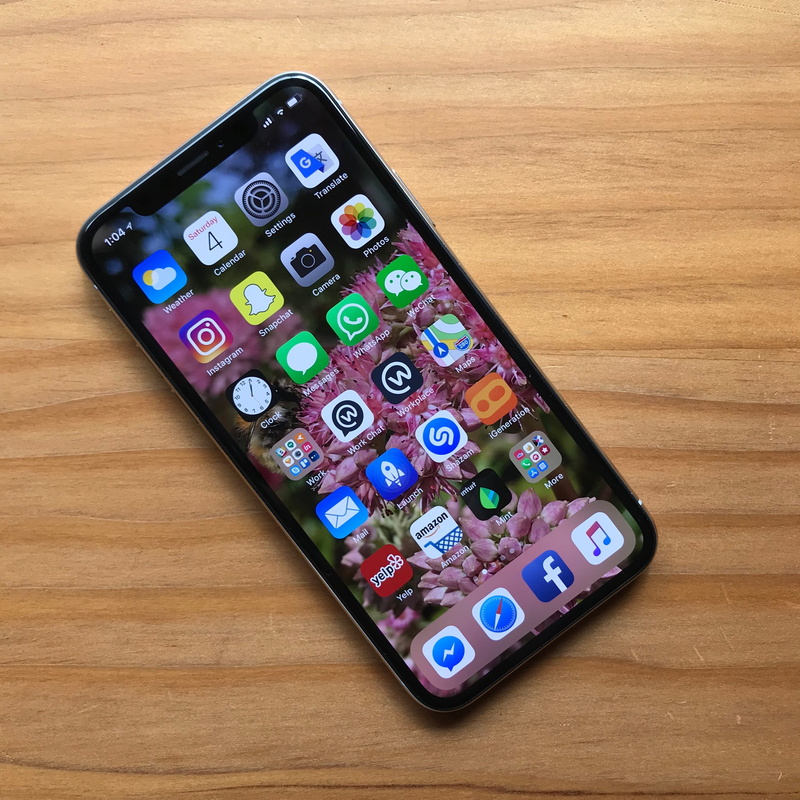 personal accessory, apps, in a row, technology, phone, choice, side by side, directly above, wood - material, art and craft, close-up, multi colored, homescreen