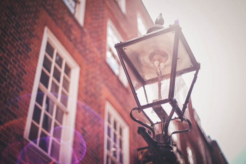 outdoors, photography, electric lamp, building exterior, low angle view, brick, light, 5K, old, window, focus, day, building, london, turned, wall - building feature