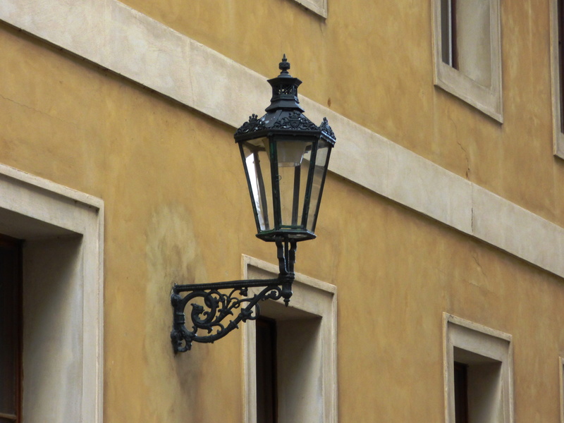 light fixture, old lamppost, window, no people, wall - building feature, lights, architecture, old, low angle view, facade, lighting equipment, building Exterior