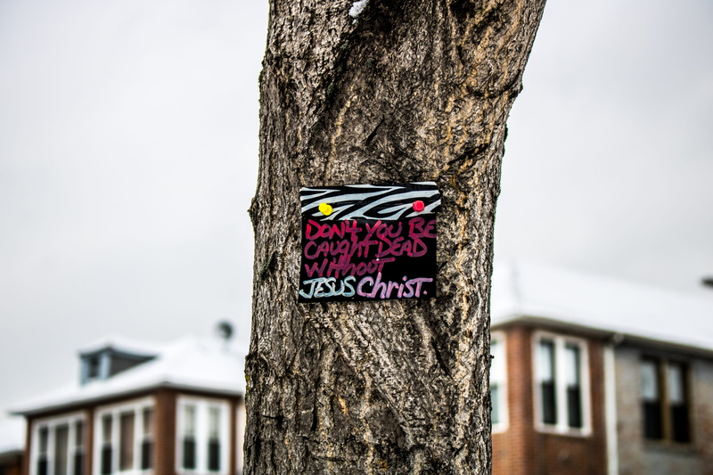 close -up, building exterior, focus on foreground, tree, guidance, tree bark, sign, nature, house, sky, built structure, information sign, no people, cloudy sky