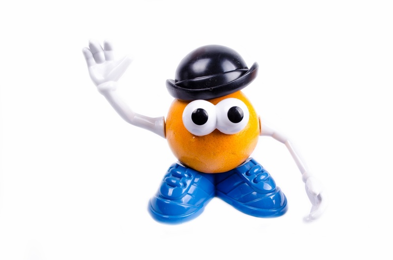 eyes, yellow, slice, representation, segment, citrus, no people, indoors, tropical, studio shot, humor, blue, celebration, smiling, diet, animal, animal representation