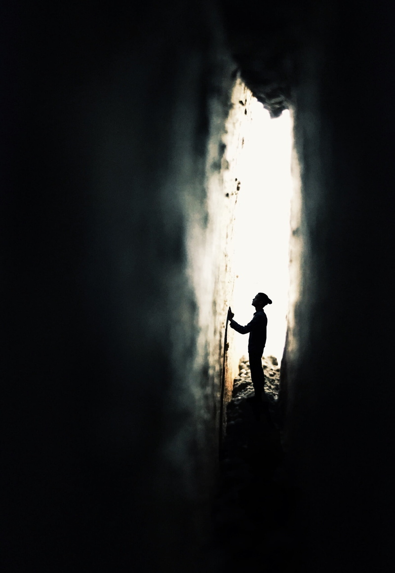 built structure, copy space, silhouette, real people, outdoors, profile view, day, wall - building feature, the gaps, men, near, prayer, profile, male