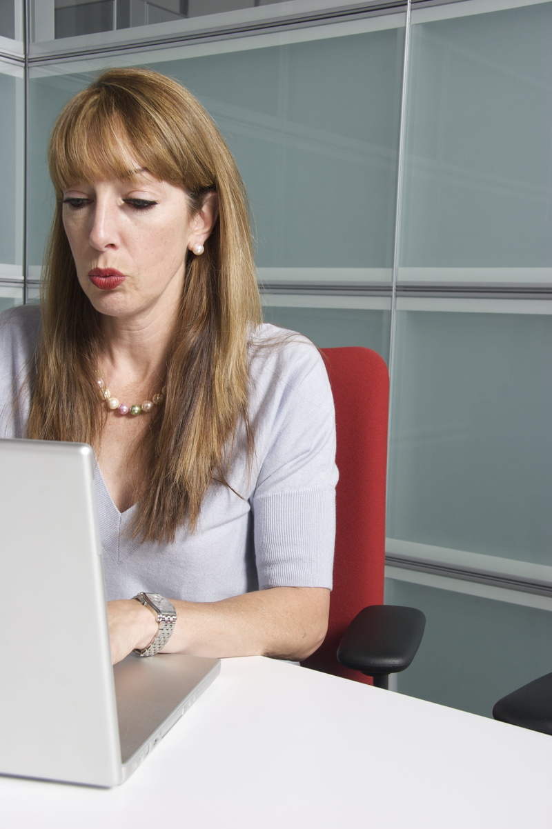 surfing the net, computer, laptop, technology, females, only women, contemplation, young Adult, real people, hairstyle, dialogue, communication, one woman only