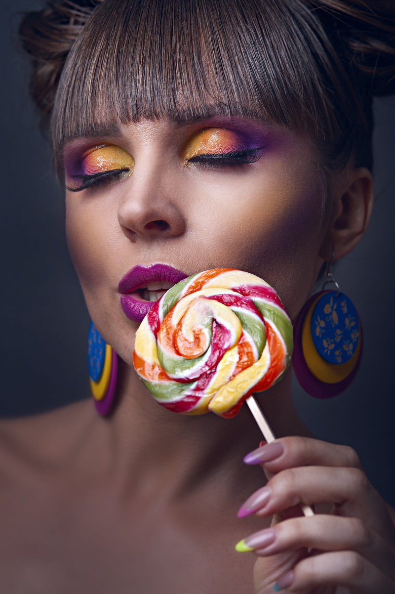 colorful, candy, human face, girl, bangs, temptation, beautiful woman, sweet, close, woman, sweet food, beauty, style, model, eyeshadow, facial expression