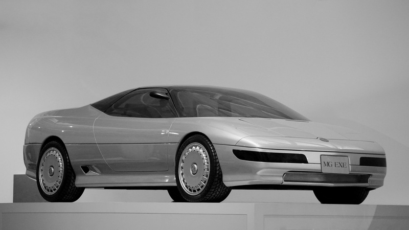 wheel, engineering, high-tech, manufacture, shiny, copy space, british, no people, profile view, silver colored, machine, automobile, sports car, indoors