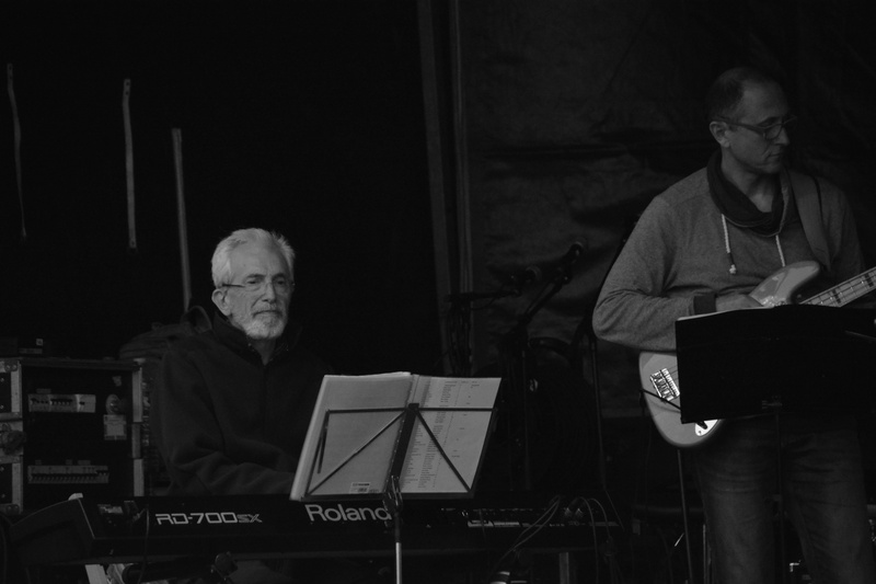 conductor, sit, indoors, performance, performer, sitting, singer, pianist, front view, elderly, artist, senior adult, microphone stand, standing, mature adult