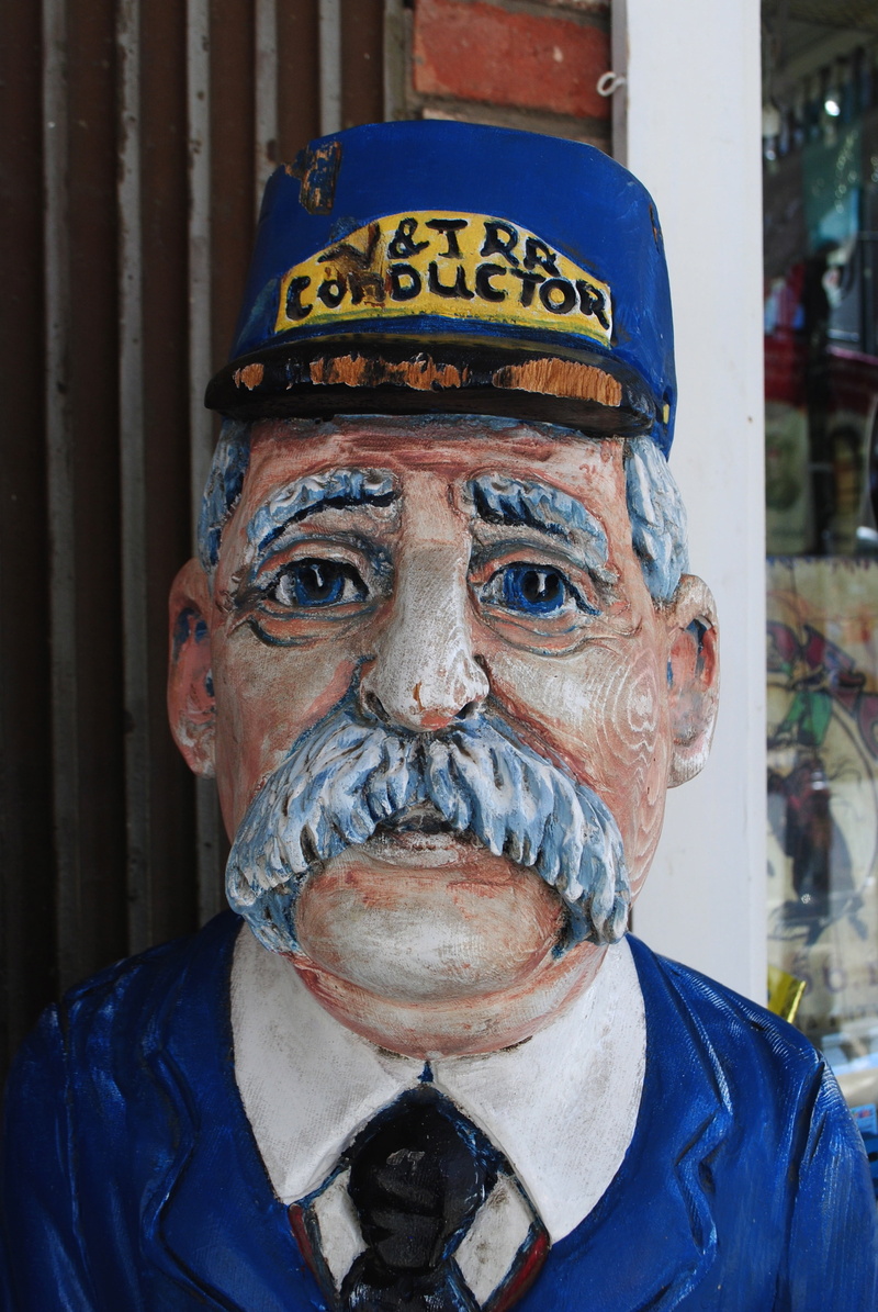 train conductor, body part, digital composite, lifestyles, close-up, virginia city, western, obscured face, human face, real people, senior men, men, indoors