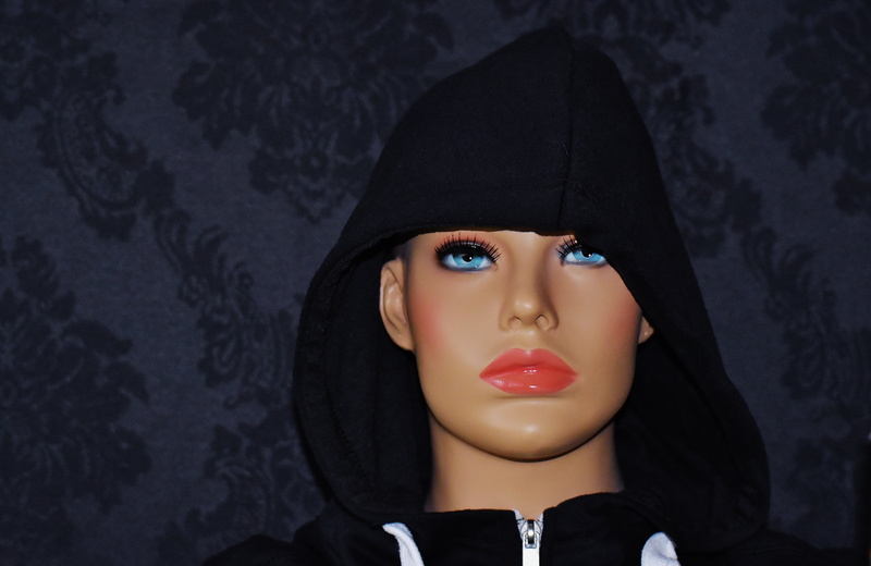5K, black color, one woman only, display dummy, body part, one young woman only, blue eye, hood, studio shot, model, mannequin, hat, beautiful woman, female