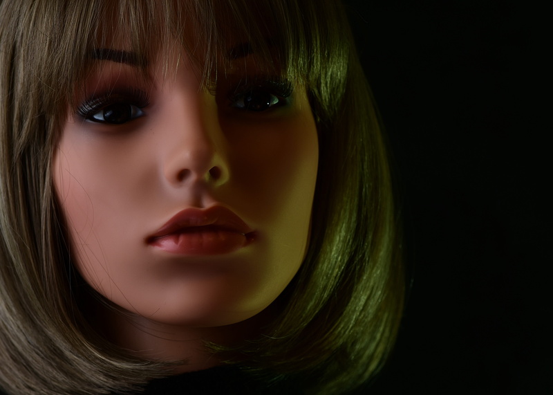 body part, looking at camera, studio shot, human body part, human lips, hairstyle, beauty, pretty, hair, one person, beautiful woman, beautiful, head, black background