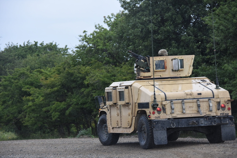 tree, stationary, military, nature, land, day, 2K, road, united states army, mode of transportation, land vehicle, rear view, humvee, truck, commercial land vehicle