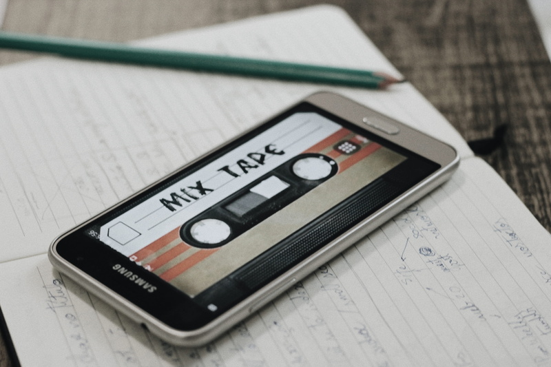 writing, no people, white, number, focus on foreground, selective focus, tape, black, still life, text, wood - material, vintage, technology, work, convenience