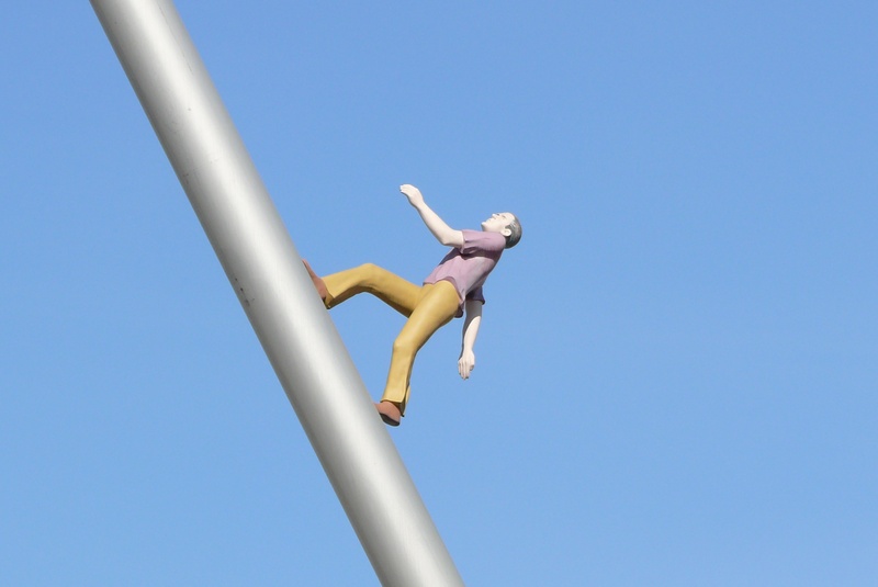 day, man, lifestyles, modern, exhibition, artists, art, heaven help us, metal, full length, human arm, sculpture, leisure activity, fun, low, copy space