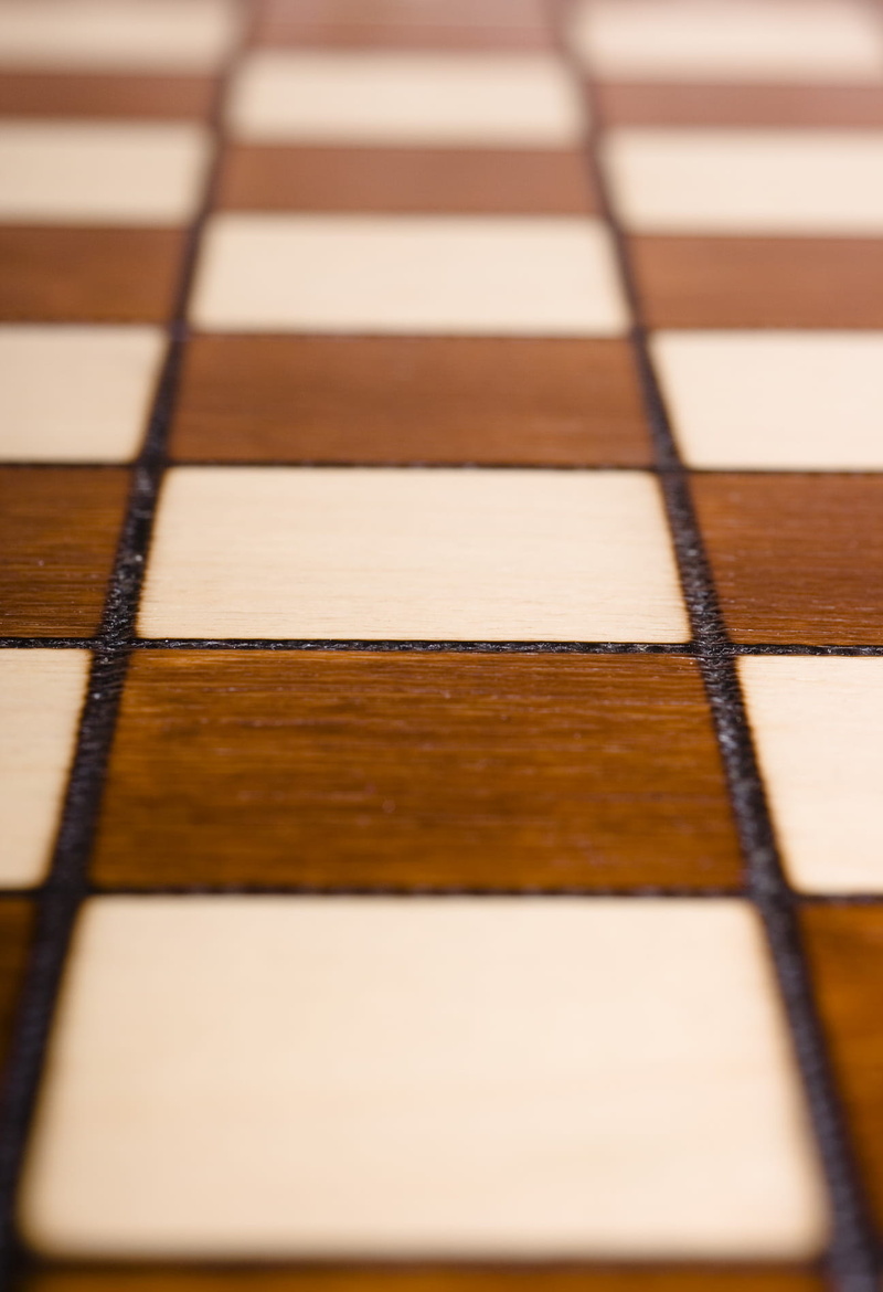 white, high angle view, pattern, full frame, backgrounds, design, no people, indoors, square shape, chessboard, intelligence, brown, chess board, close-up