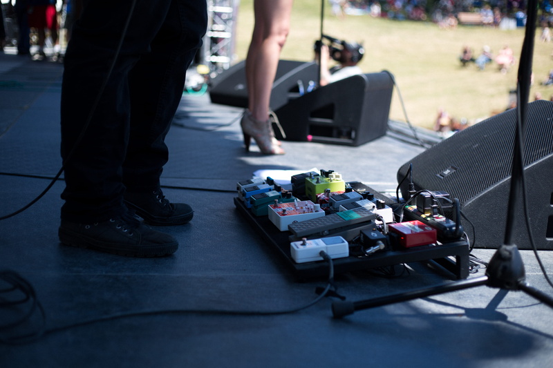 rock, incidental people, city, day, selective focus, men, board, indie, human limb, performance, standing, modifier, human leg, live, group of people, transportation
