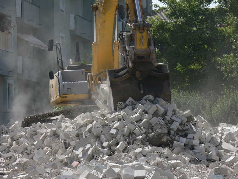 construction machinery, gray, black, vehicle, earth mover, yellow, construction site, solid, site, container, large group of objects, rock - object, junkyard