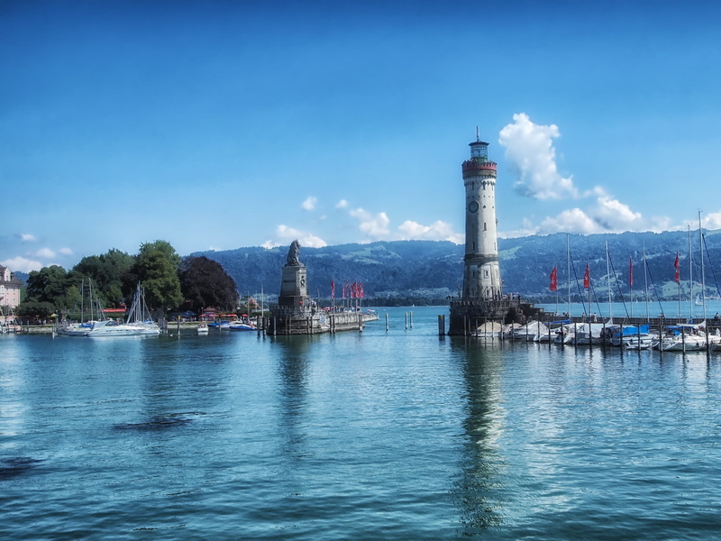 outdoors, no people, blue sky, germany, forest, smoke stack, Lighthouse, passenger craft, architecture, bay, transportation, tall - high, tower, city, nature