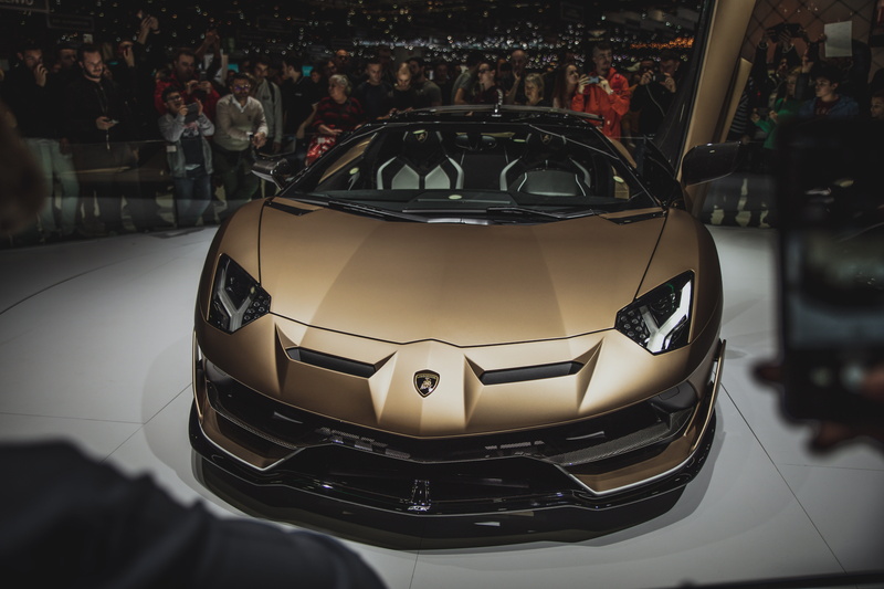 representation, indoors, luxury, focus on foreground, motor vehicle, mode of transportation, auto, car, high angle view, expensive, glass - material, lamborghini