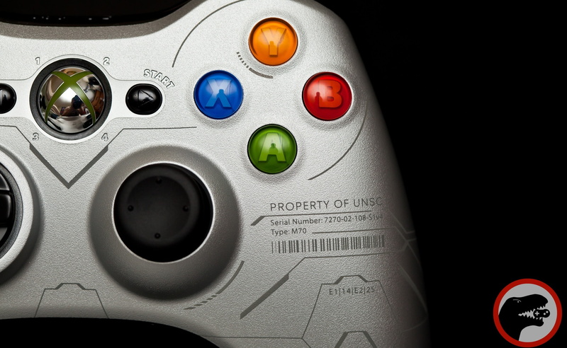ball, Computers, joystick, Xbox 360, design, control, sign, xbox, no people, circle, studio shot, indoors, western script, black background, close-up, halo reach