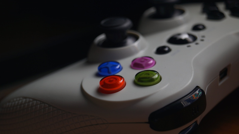 macro, multi colored, table, no people, sports equipment, shadow, success, close-up, 5K, focus on foreground, fun, gamepad, still life, indoors, arts culture and entertainment