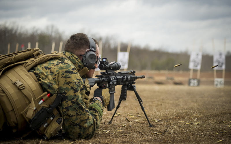 shooting a weapon, United States Marine Corps, one person, conflict, machine gun, adult, military, government, black, war, camouflage clothing, soldiers