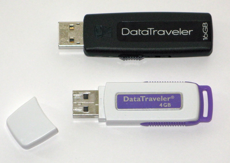technology, western script, close-up, 16 gb with retractable connector, white color, communication, connection, studio shot, electronics, 16 gb and 4 gb