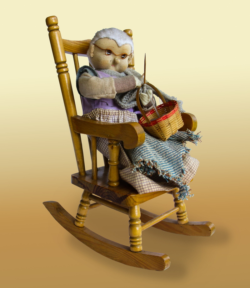 art and craft, Crochet, seat, colored background, toy, rocking Chair, studio shot, old, chair, figurine, Grandmother, doll, 2K, rocking, childhood, old-fashioned