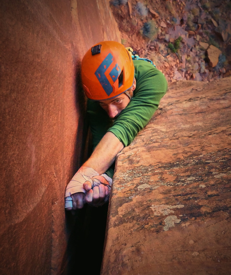 black diamond, adventure, rock climbing, belay, helmet, leisure activity, full length, climber, one person, real people, climbing rope, wall - building feature