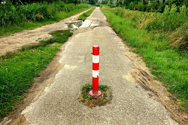 red-white safety barrier, day, rural scene, outdoors, asphalt, path, post, grass, diminishing perspective, no entry post, white, green color, nature, footpath