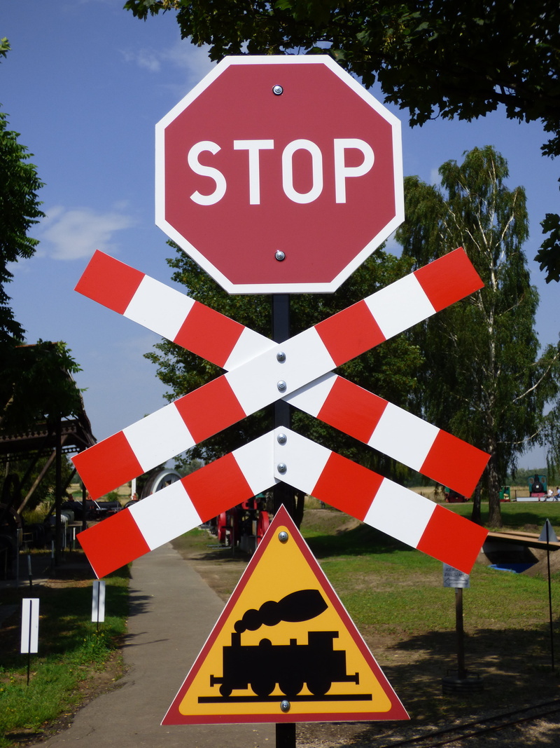day, crossing sign, street, warning symbol, no people, railway crossing, information, outdoors, railroad tracks, warning, symbol, designation, the passage of